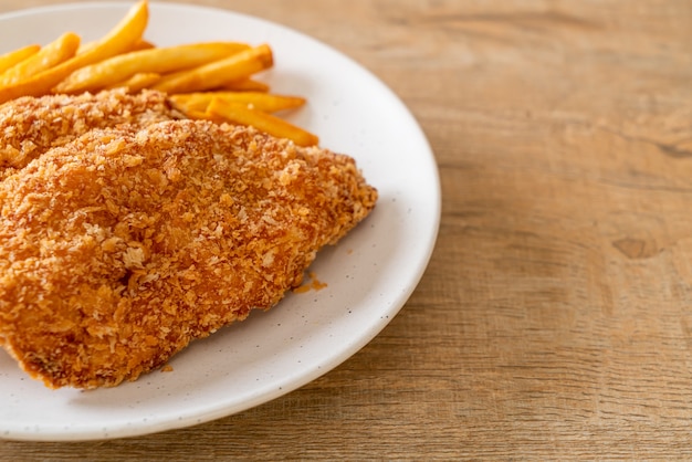 fried chicken breast fillet steak with French fries