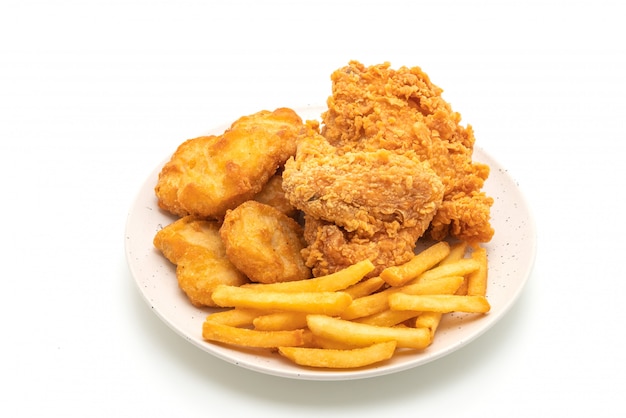 fried chicken with french fries and nuggets meal (junk food and unhealthy food)