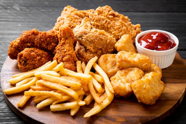 fried chicken with french fries and nuggets meal