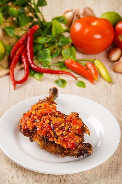 Fried Chicken with Sambal Balado Fried Chicken with Sambal Balado is Traditional food from Padang West Sumatra