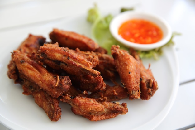 Fried chicken on wood background