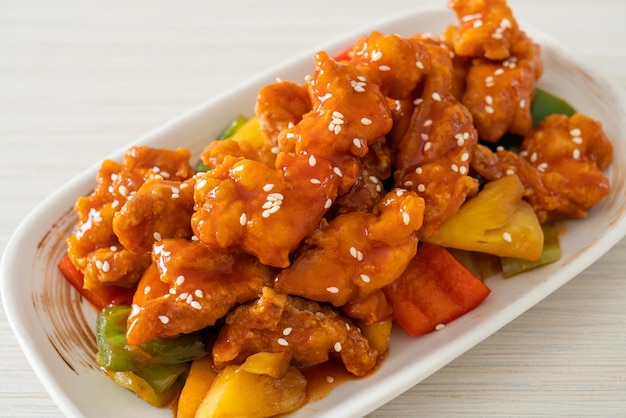 fried crispy chicken with sweet and sour sauce in Korean style