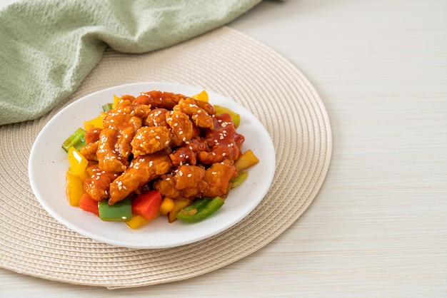 fried crispy chicken with sweet and sour sauce in Korean style