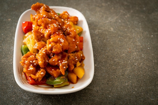 fried crispy chicken with sweet and sour sauce in Korean style