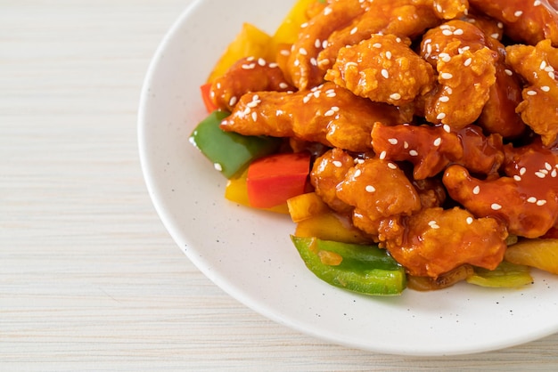 fried crispy chicken with sweet and sour sauce in Korean style