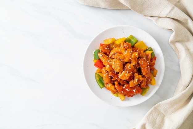 fried crispy chicken with sweet and sour sauce in Korean style