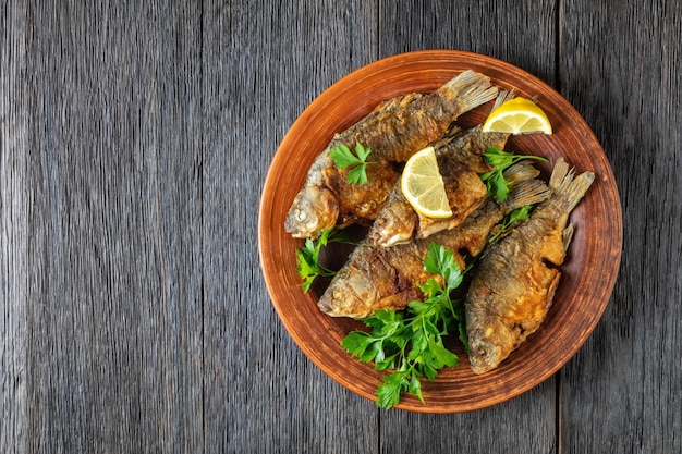 Fried crucian carps with golden crispy crust