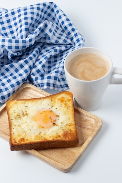 Fried Egg on Toast and cup of Coffee for Breakfast.