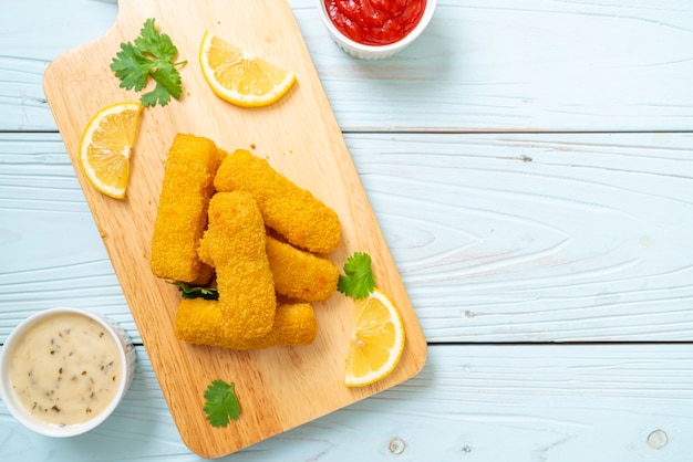 Photo fried fish finger stick or french fries fish with sauce