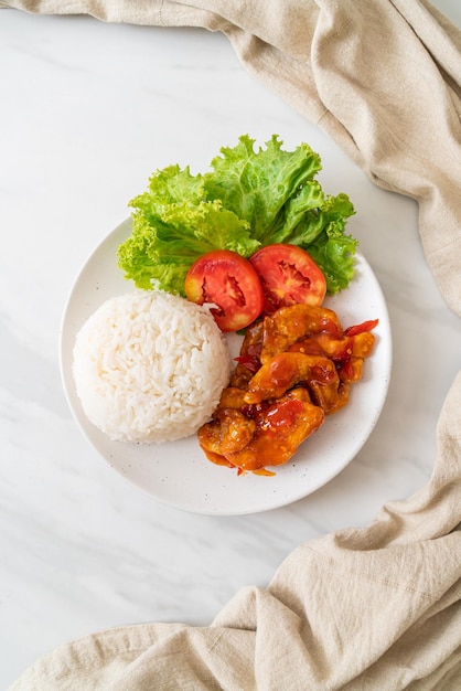 Fried fish topped by 3 flavors chili sauce with rice