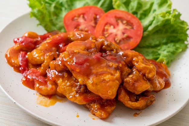 Fried fish topped with 3 flavors chili sauce