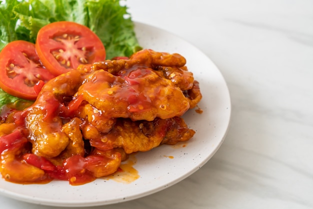 Fried fish topped with 3 flavors (sweet, sour, spicy) chili sauce