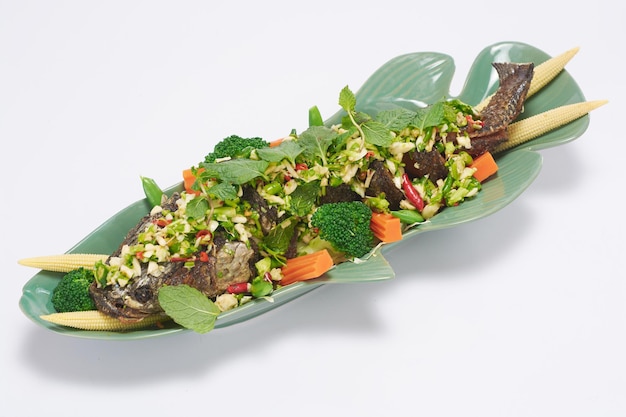 Fried Fish with Mixed Herb Salad Thai Style,snakehead fish