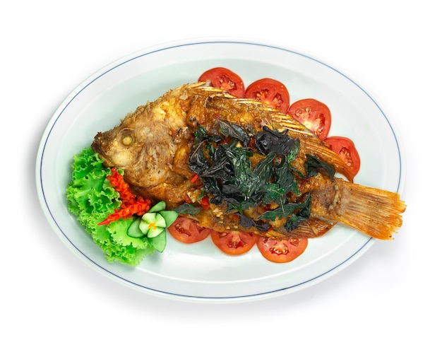 Fried Fish with Spicy Sauce ontop crispy Basil Thai Food Asian fusion Style Cooked Deep Fried