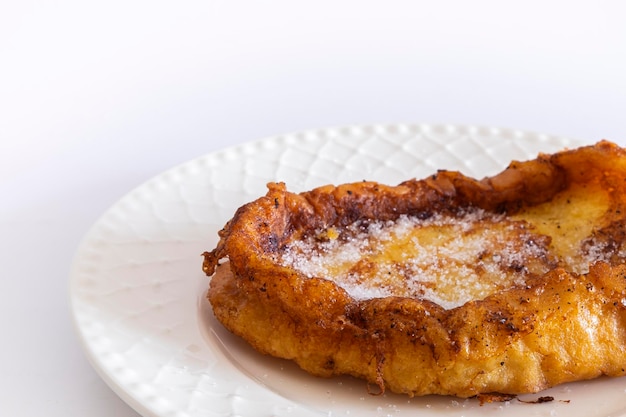 Fried French toast Torrijas Typical Spanish Easter sweet Vertical photography and selective focus