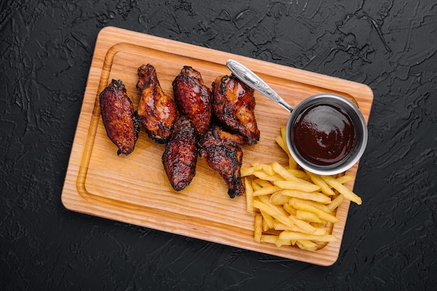 Fried glazed chicken wings and legs