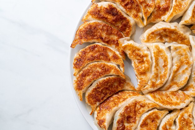 fried gyoza or dumplings snack with soy sauce