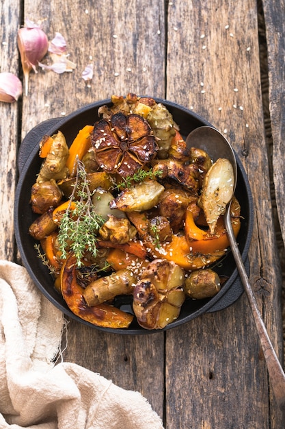 Fried Jerusalem artichoke with pumpkin and seasonings