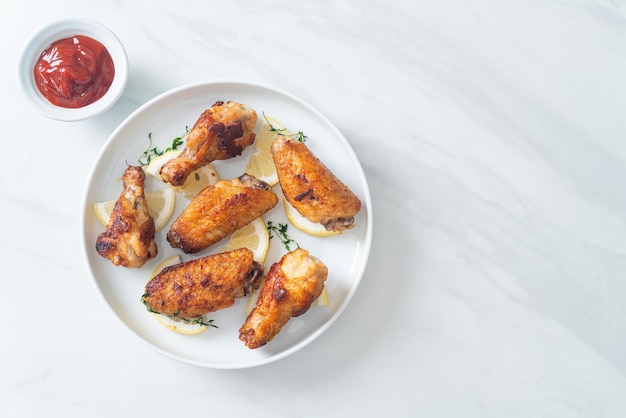 fried lemon pepper chicken wings with thyme