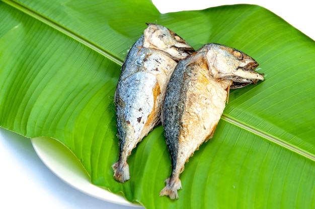 Fried Mackerels with green leaf