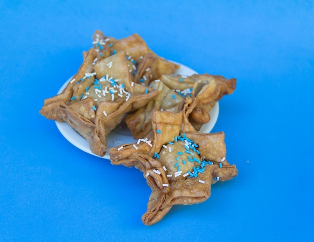 Fried pastry with quince and batata typical of argentina gastronomy