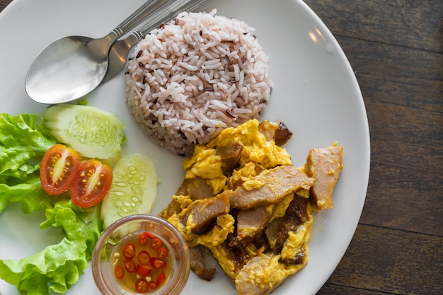 Fried pork with egg and rice