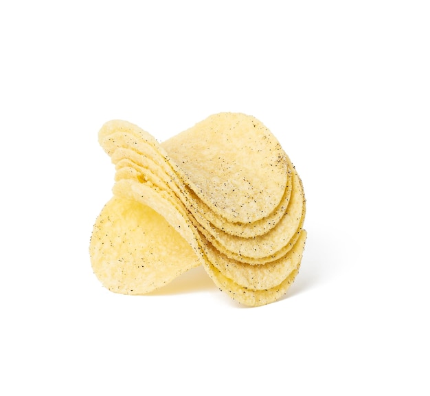 Fried potato chips with salt and black pepper on a white plate. Fast food