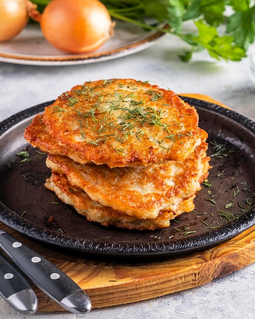 Fried potato pancakes on a pan