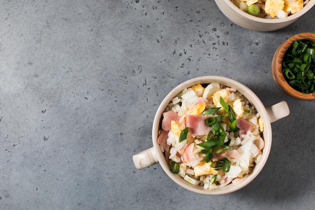 Fried rice with bacon and egg asian rice dish copy space