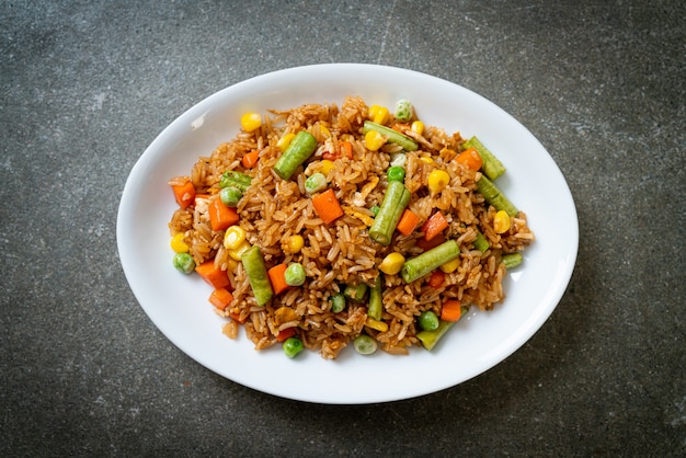 fried rice with green peas, carrot and corn - vegetarian and healthy food style