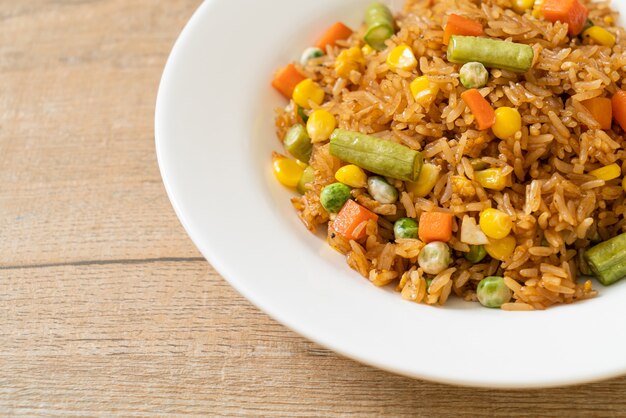 fried rice with green peas, carrot and corn - vegetarian and healthy food style