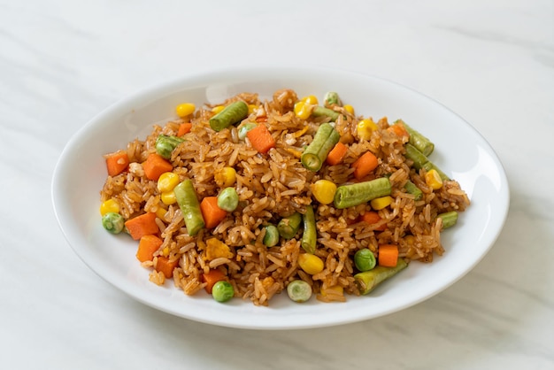 fried rice with green peas, carrot and corn - vegetarian and healthy food style