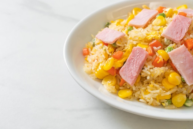 Fried rice with ham and mixed vegetable carrot green bean peas carrot