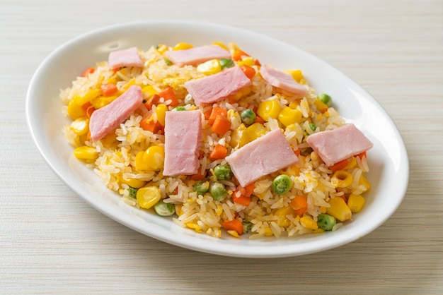 fried rice with ham and mixed vegetable carrot green bean peas carrot