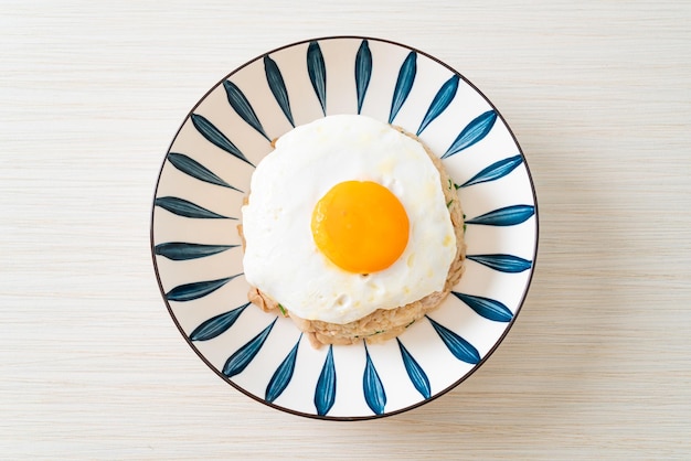 fried rice with pork and fried egg in Japanese style - Asian food style