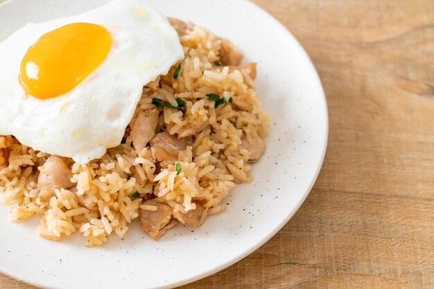 fried rice with pork and fried egg in Japanese style - Asian food style