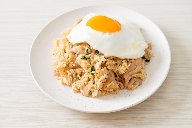 fried rice with pork and fried egg in Japanese style - Asian food style