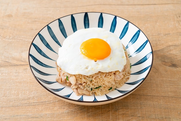 fried rice with pork and fried egg in Japanese style - Asian food style