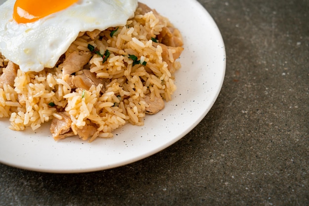 Fried rice with pork and fried egg in Japanese style