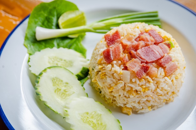 Fried rice with pork and green vegetable