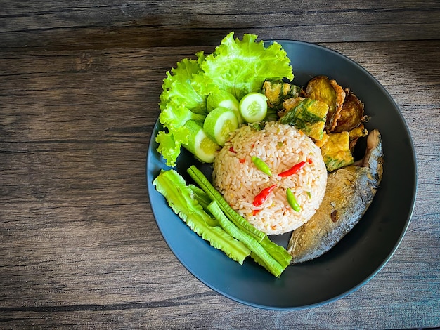 Fried rice with spicy shrimp paste dip on the table