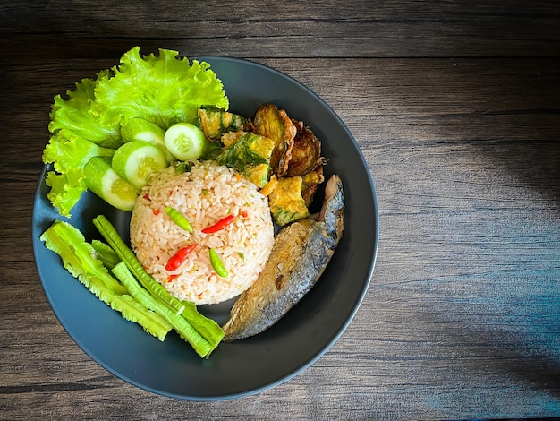 Fried rice with spicy shrimp paste dip on the table