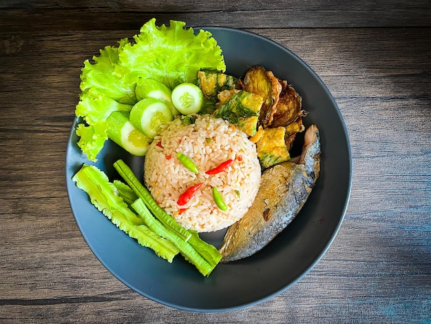 Fried rice with spicy shrimp paste dip on the table