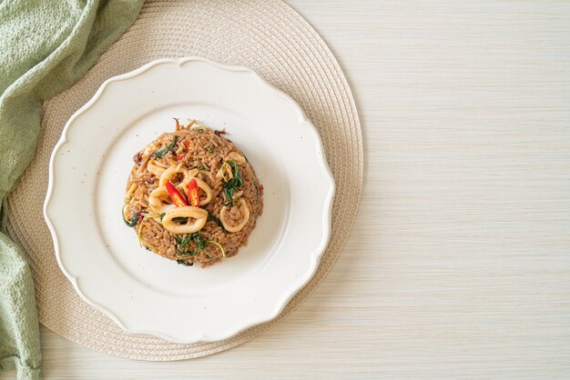 fried rice with squid and basil in Thai style - Asian food style