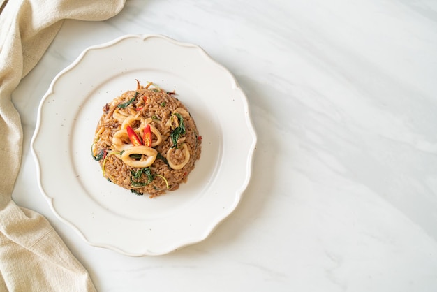 Fried rice with squid and basil in Thai style