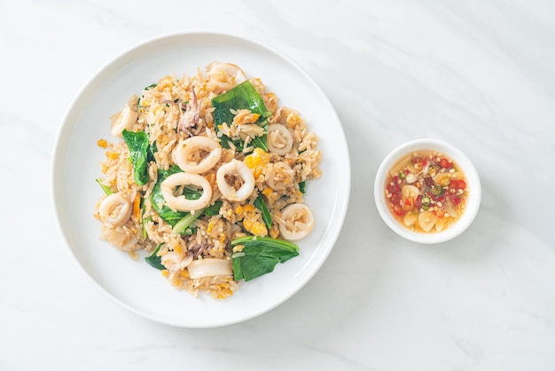 Fried rice with squid or octopus - stir-fried rice with squid, egg and kale