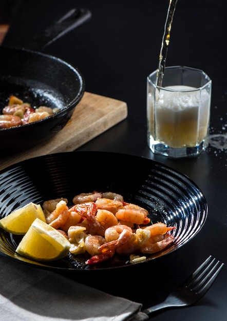 Fried royal prawns with lemon and beer