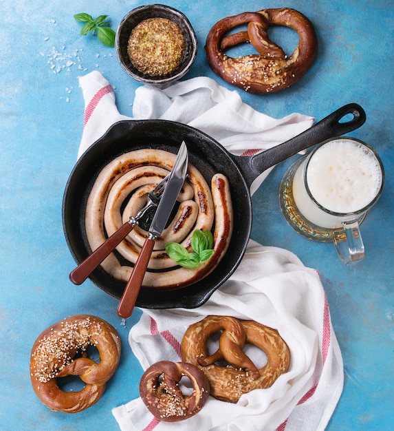 Fried sausage with beer and pretzels