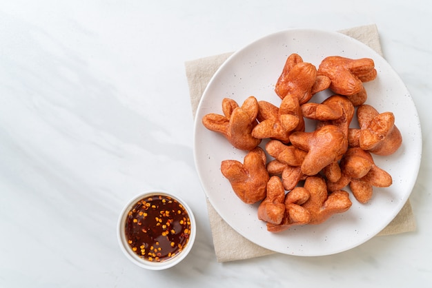 fried sausage with dipping sauce