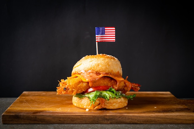 Fried shrimps burger on wood tray